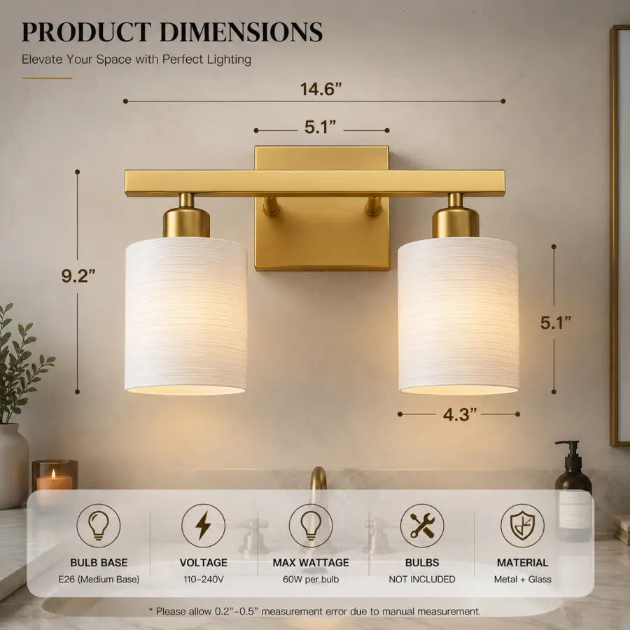 A two-light wall sconce with a brushed gold metal frame and white cylindrical fabric shades, shown with overlaid product dimension labels and a feature summary bar at the bottom.