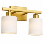 A modern two-light bathroom vanity wall sconce with a brushed gold metal frame and cylindrical white fabric shades, shown against a plain white background.