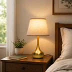3-way dimmable touch table lamp with lilen fabric , modern gold bedside lamp on a wooden side table in a cozy living room