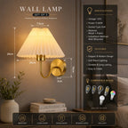 A wall lamp set shown in a styled bedroom interior with overlaid dimension lines and feature/spec text panels. The product appears to be a two-light wall lamp with pleated cream shades and warm gold/brass metal mounts.