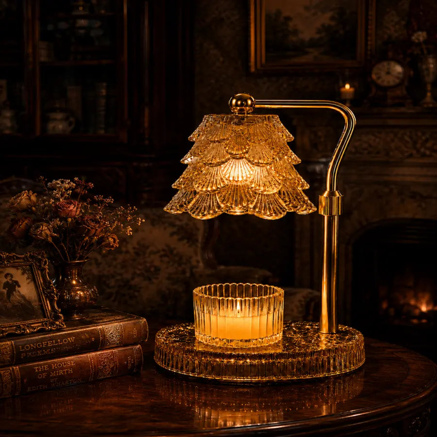 A vintage-style table lamp with a tiered crystal shade and a lit candle in a matching crystal holder, placed on a dark wooden table in a cozy, dimly lit room.