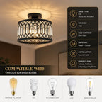 A cylindrical ceiling light fixture with a black metal frame and clear crystal-like geometric detailing, shown illuminated in a home interior. A dark information panel on the right lists product specs: E26 base type, 110V, 60W max wattage, metal crystal material, easy installation, and suitability for hallway, bedroom, entryway, and living room.