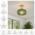 A green textured glass pendant light with a gold brass ceiling mount, shown hanging in a modern room setting. The left side features a vertical list of product features with icons, and the bottom features a horizontal bar with specifications.