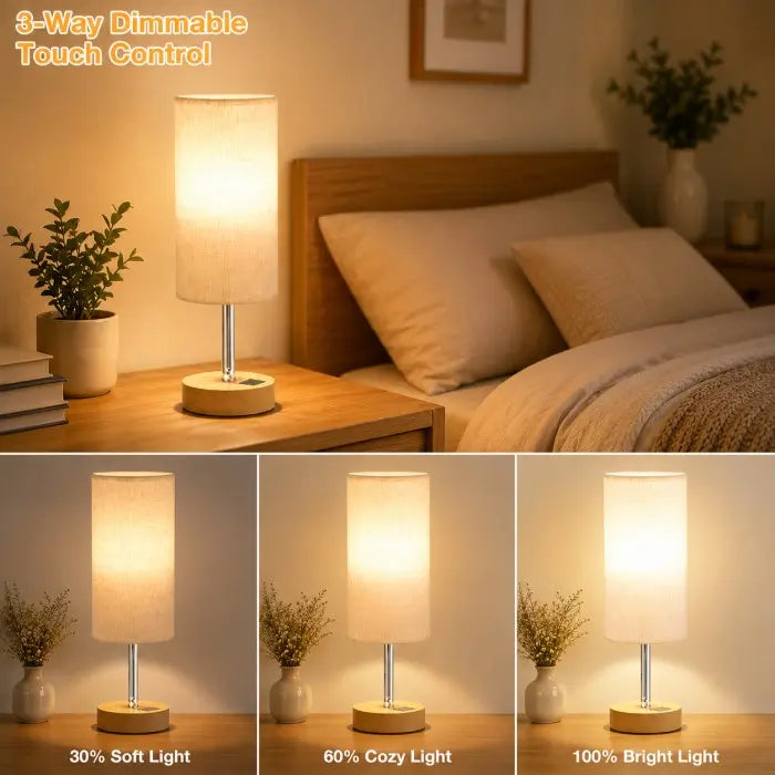 Modern bedside table lamp with USB charging port, 3-way dimmable touch control, linen fabric shade, and wooden base on a bedroom nightstand with warm ambient lighting.